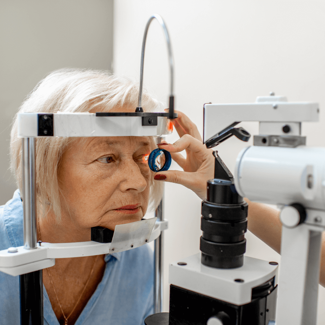 Senior woman happily reading an eye chart during a vision checkup